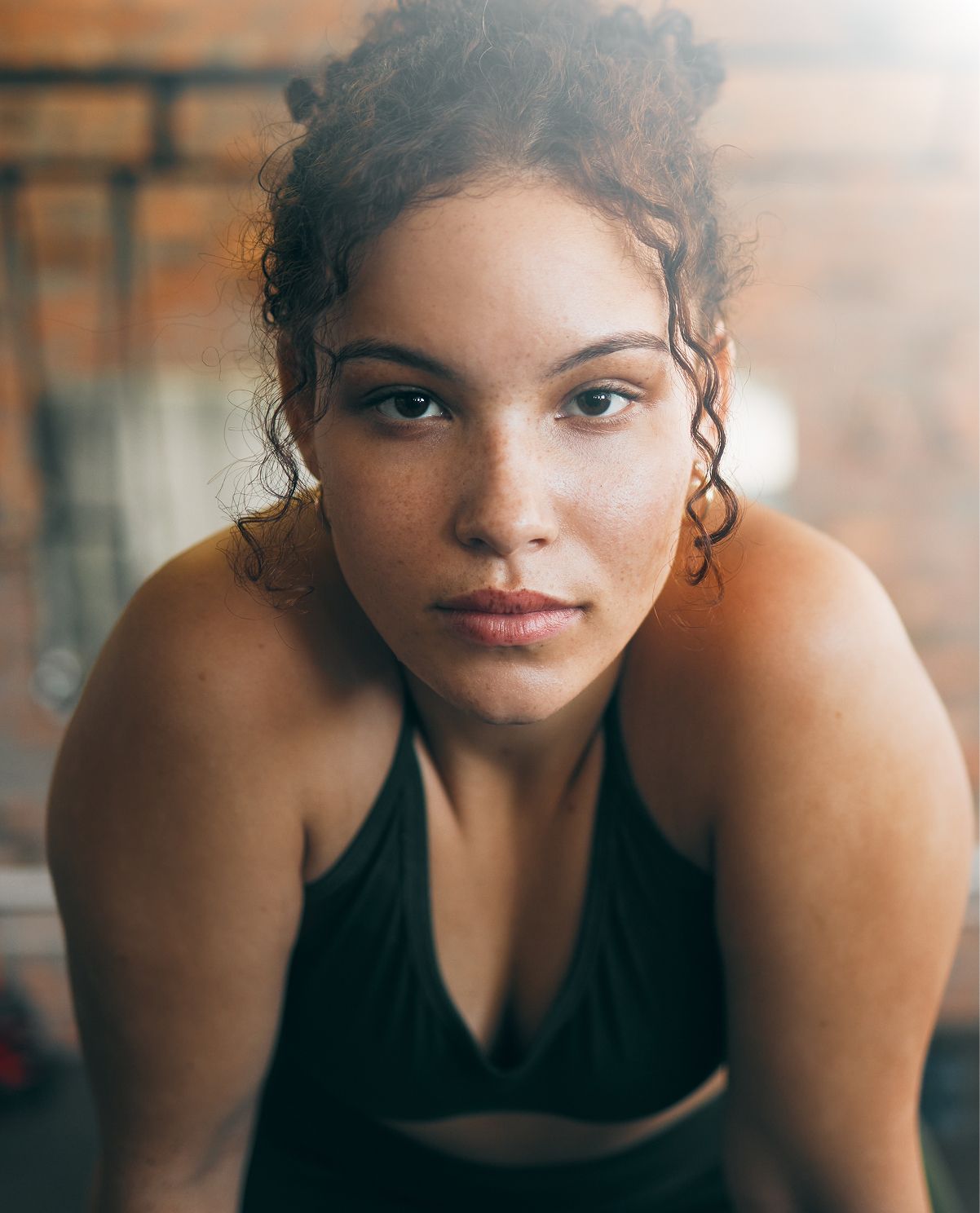 Young woman looking confidently at the camera.